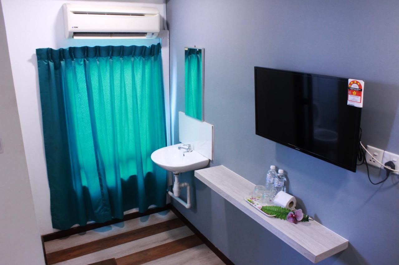 Kapit Hotel Кучинг Экстерьер фото